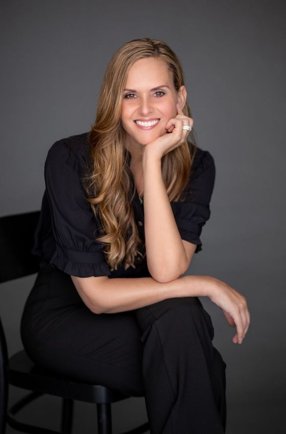 Portrait of Kristen Marinak, Licensed Real Estate Advisor.